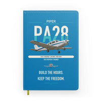 Thumbnail for Piper PA-28 Cherokee design on turquoise notebook