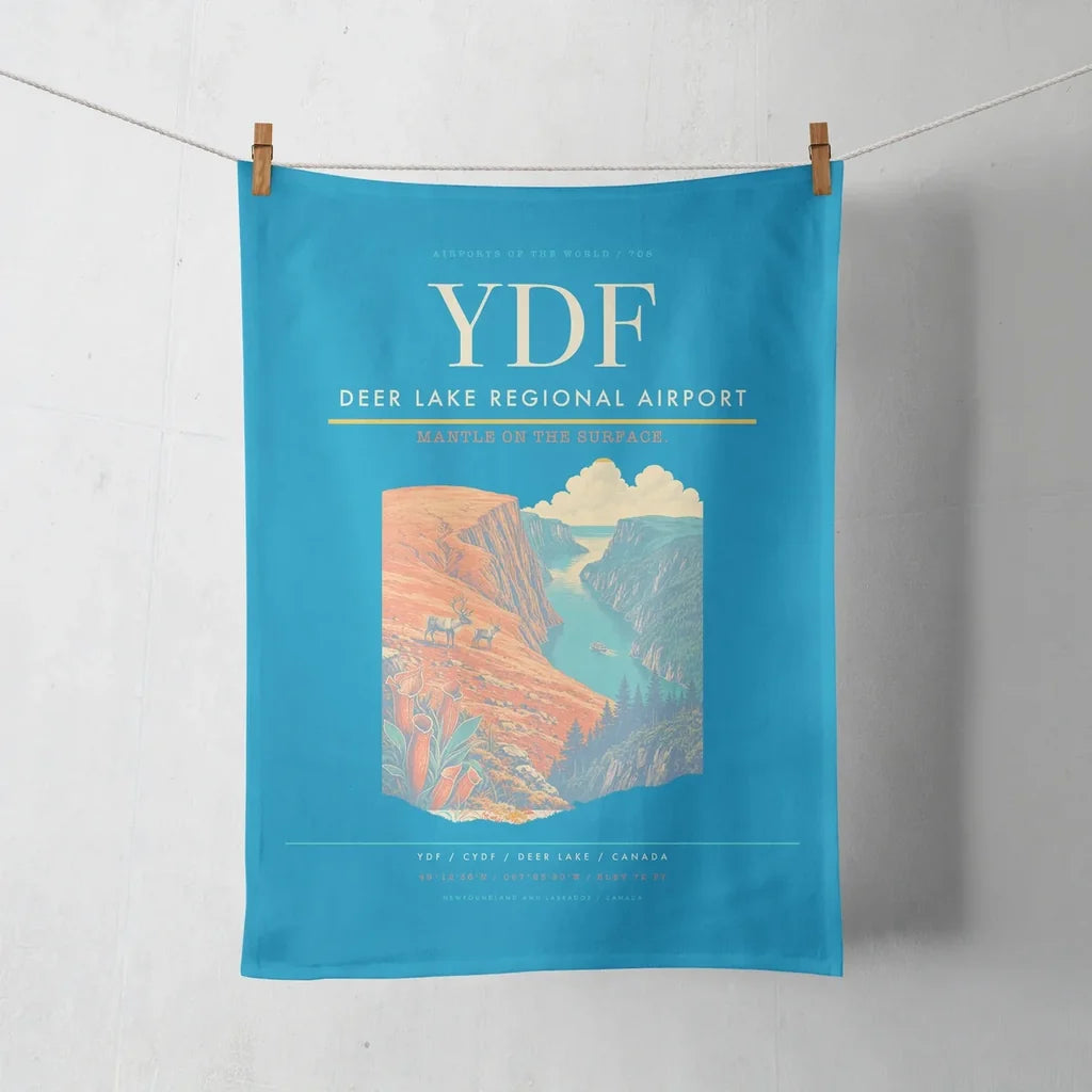 Deer Lake Regional Airport (YDF) design on turquoise towel