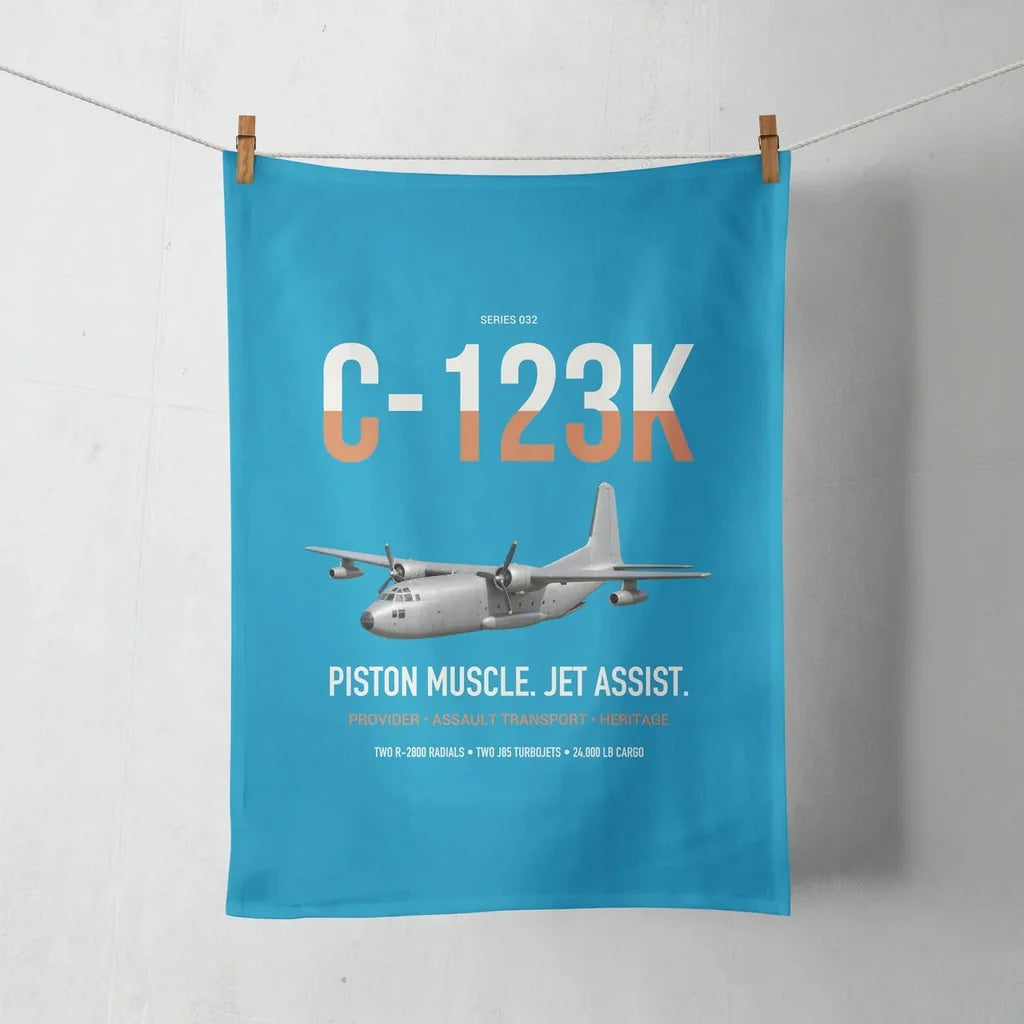 C-123K Provider design on turquoise towel