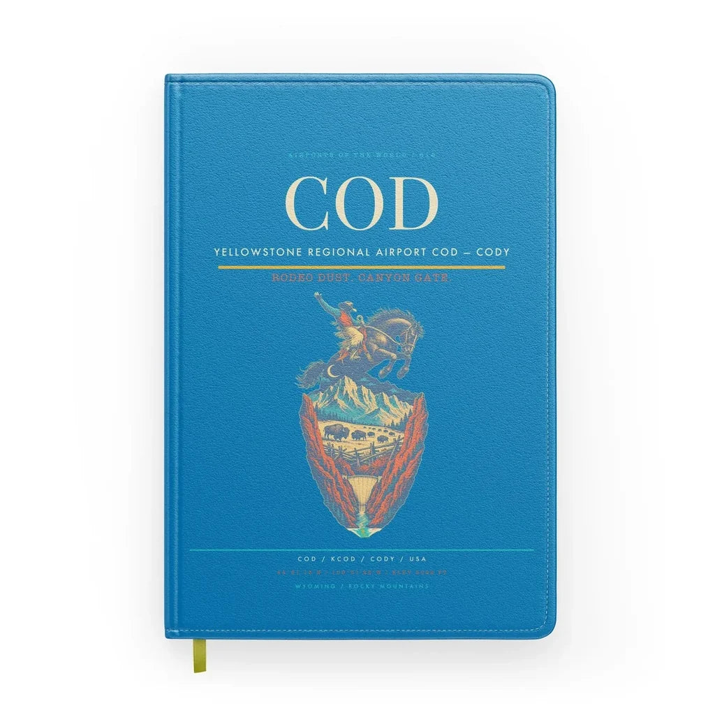 Yellowstone Regional Airport (COD) design on turquoise notebook