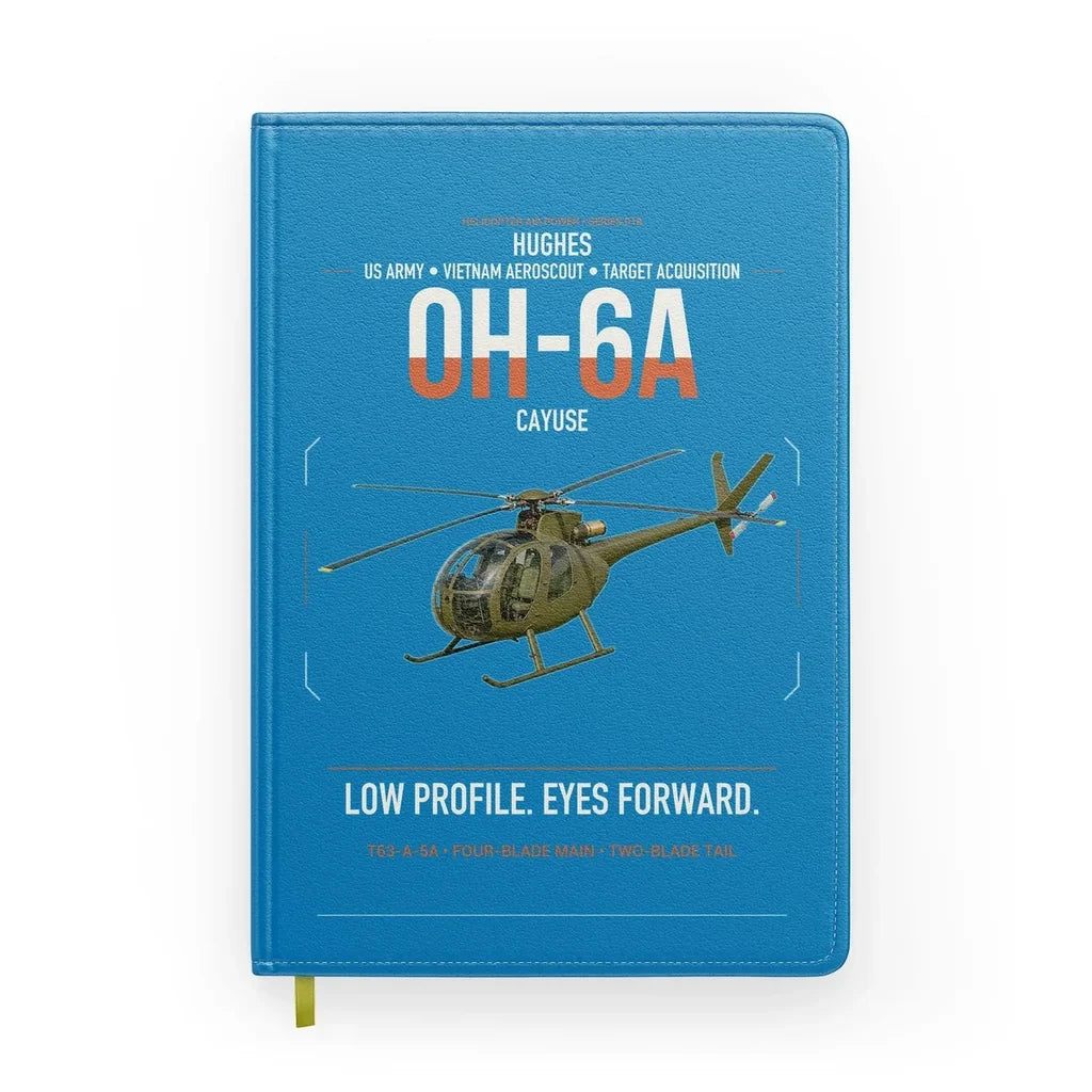 Hughes OH-6A Cayuse design on turquoise notebook
