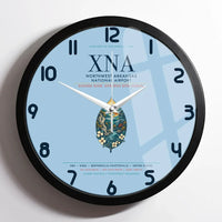 Thumbnail for Northwest Arkansas National Airport (XNA) design on light blue framed wall clock