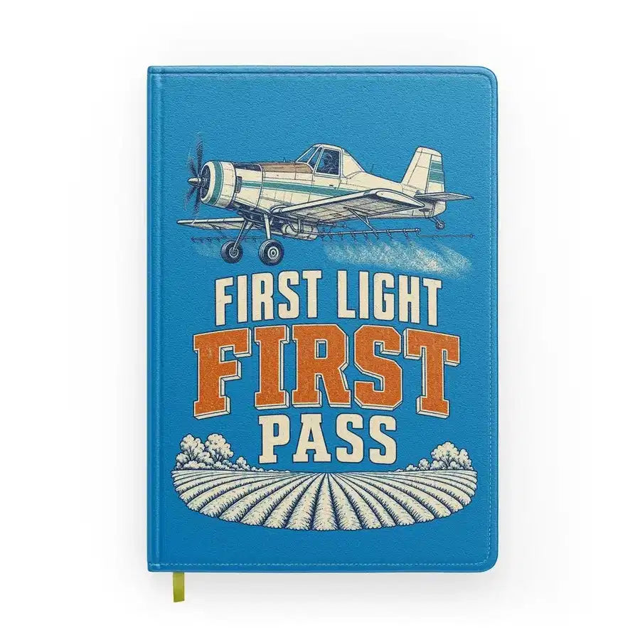 First Light First Pass design on turquoise notebook