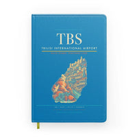 Thumbnail for Tbilisi International Airport (TBS) design on turquoise notebook