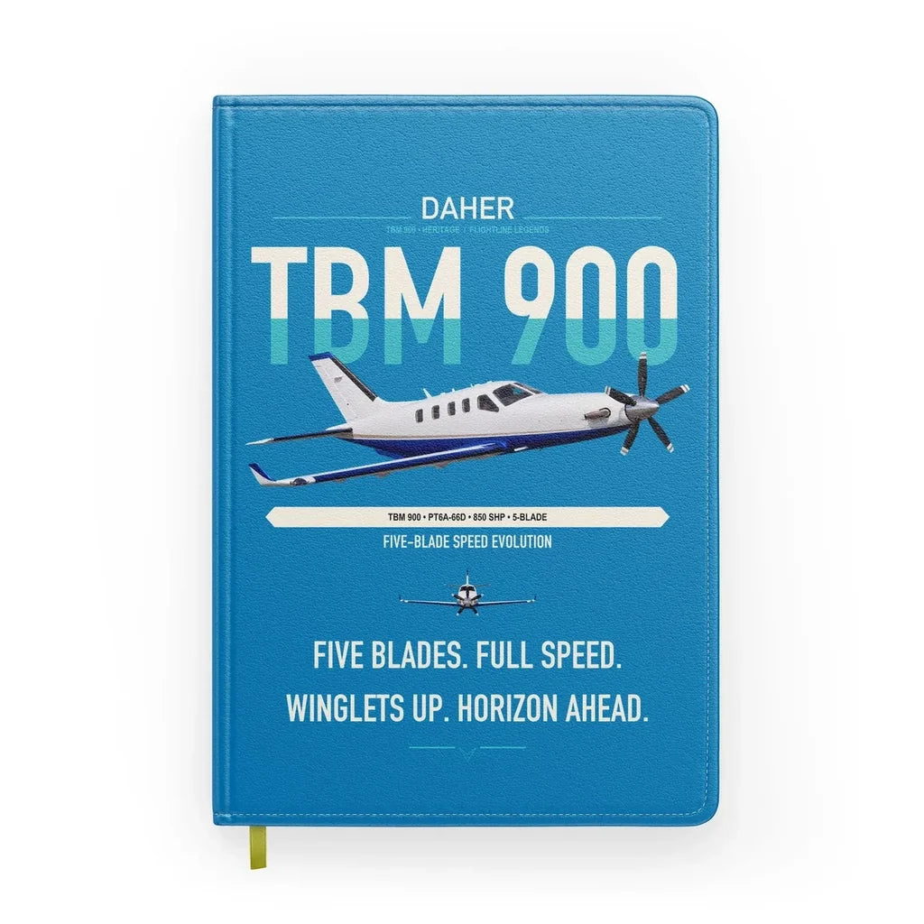 Daher TBM 900 design on turquoise notebook
