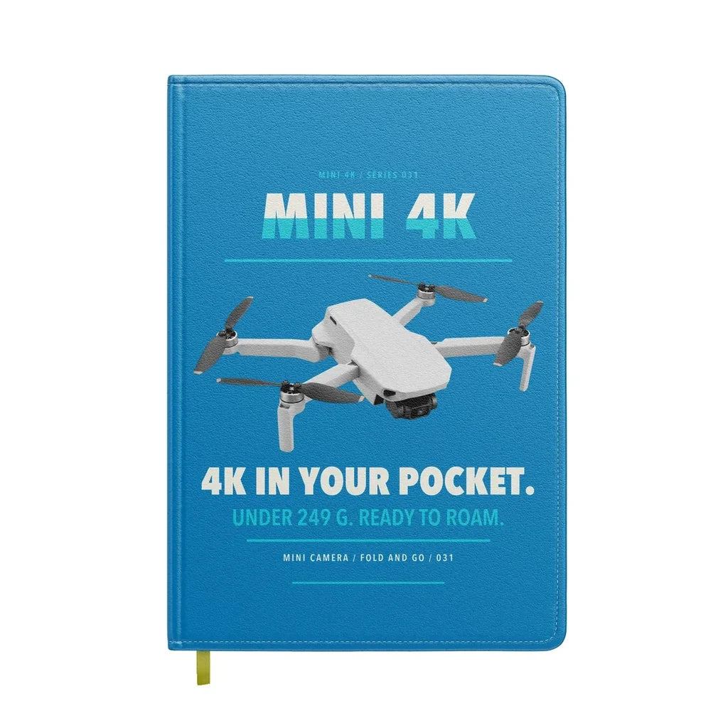 DJI Mini 4K design on turquoise notebook