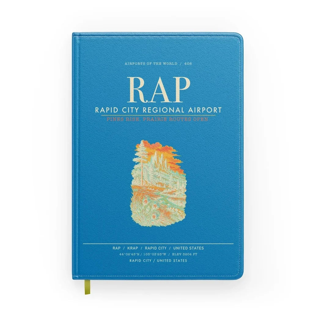 Rapid City Regional Airport (RAP) design on turquoise notebook