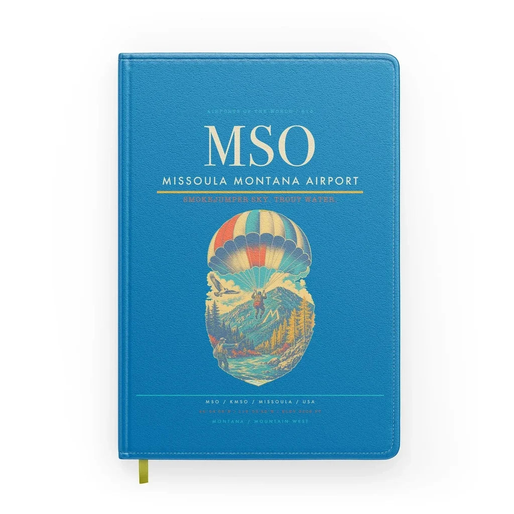 Missoula Montana Airport (MSO) design on turquoise notebook