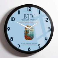Thumbnail for Patrick Leahy Burlington International Airport (BTV) design on light blue framed wall clock