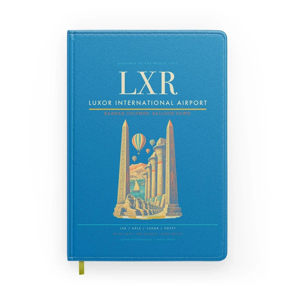 Luxor International Airport (LXR) design on turquoise notebook