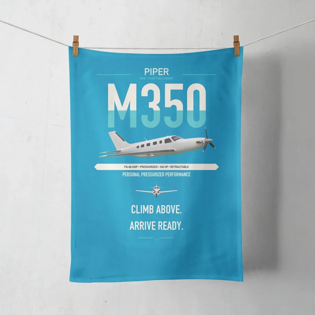 Piper M350 design on turquoise towel