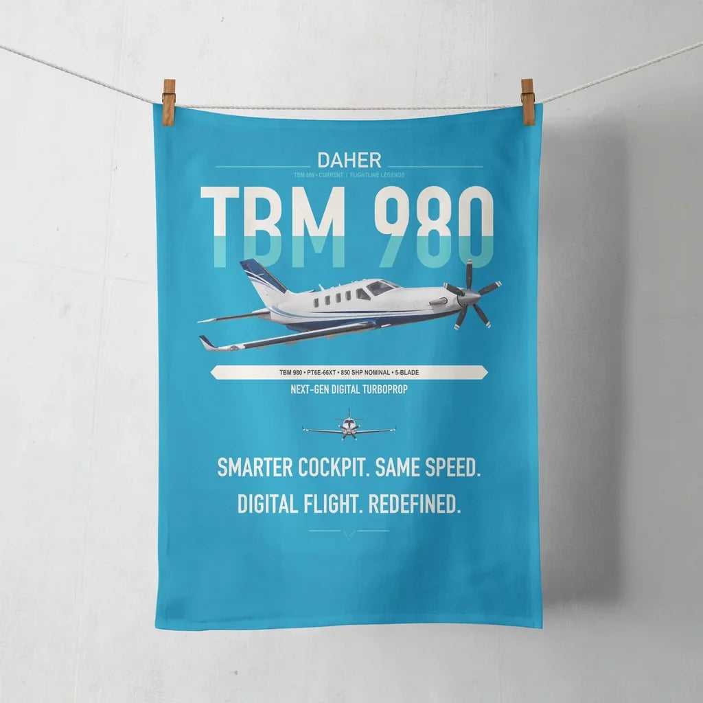Daher TBM 980 design on turquoise towel