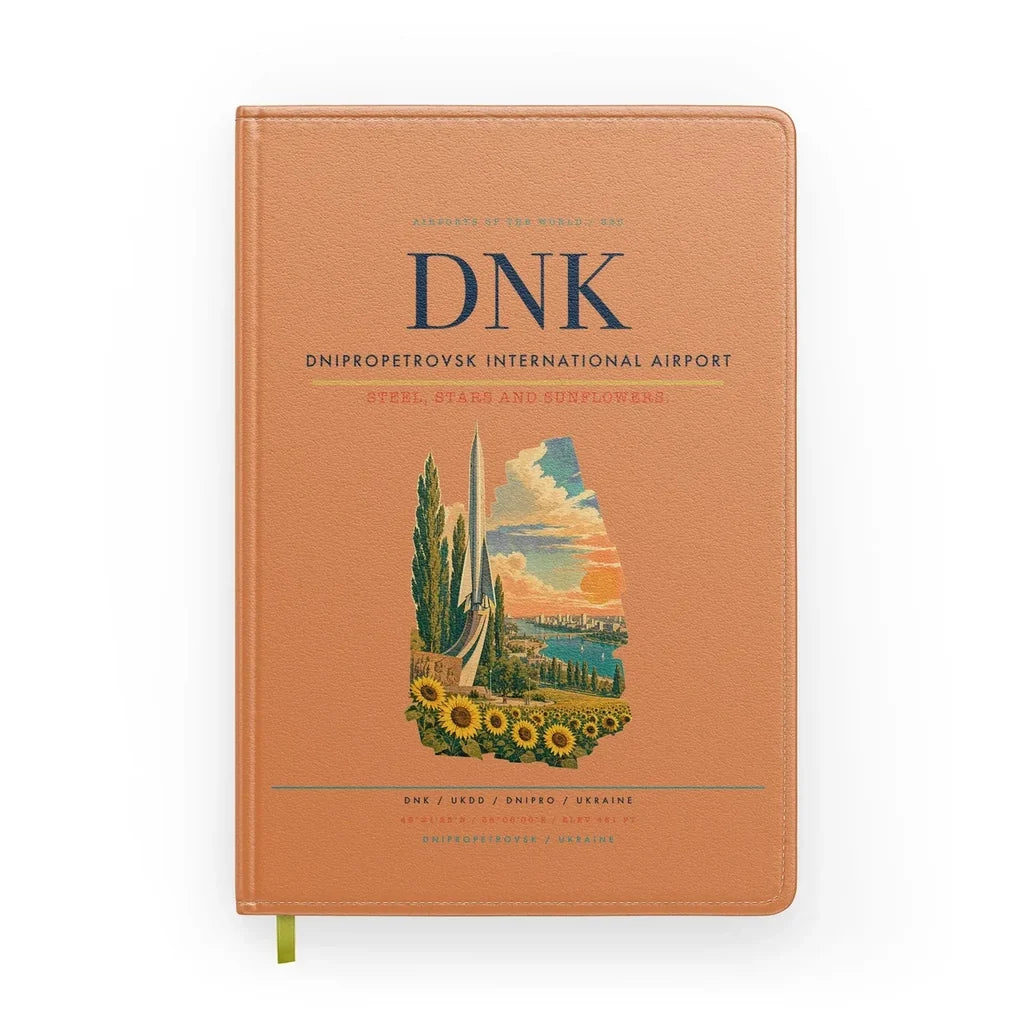Dnipropetrovsk International Airport (DNK) design on orange notebook