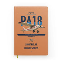 Thumbnail for Piper PA-18 Super Cub design on orange notebook