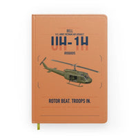 Thumbnail for Bell UH-1H Iroquois design on orange notebook