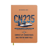 Thumbnail for Airbus CN235-300M design on orange notebook