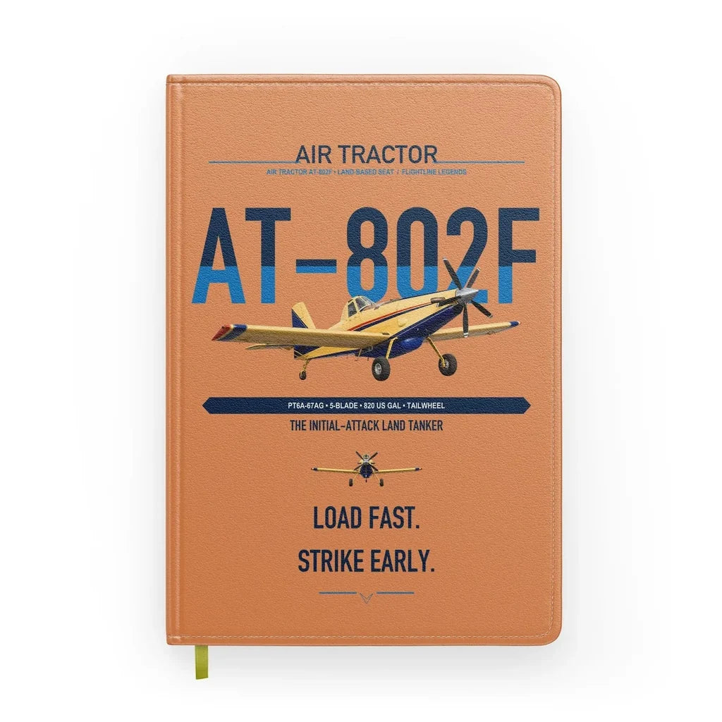 Air Tractor AT-802F design on orange notebook