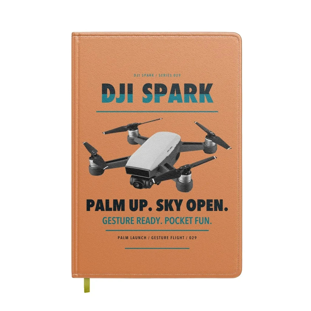 DJI Spark design on orange notebook