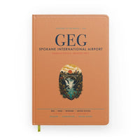 Thumbnail for Spokane International Airport (GEG) design on orange notebook