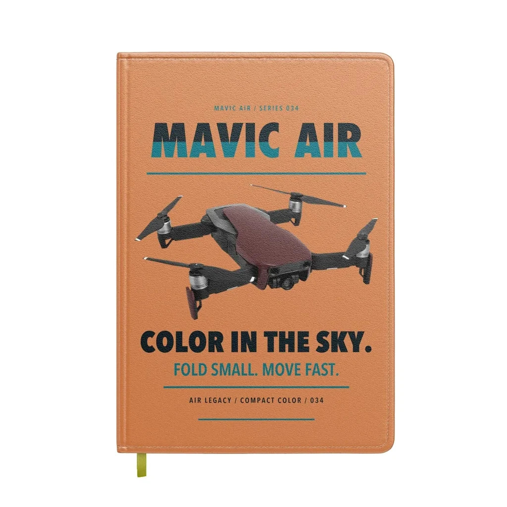 DJI Mavic Air design on orange notebook