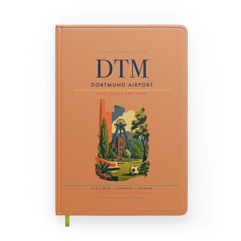 Dortmund Airport (DTM) design on orange notebook