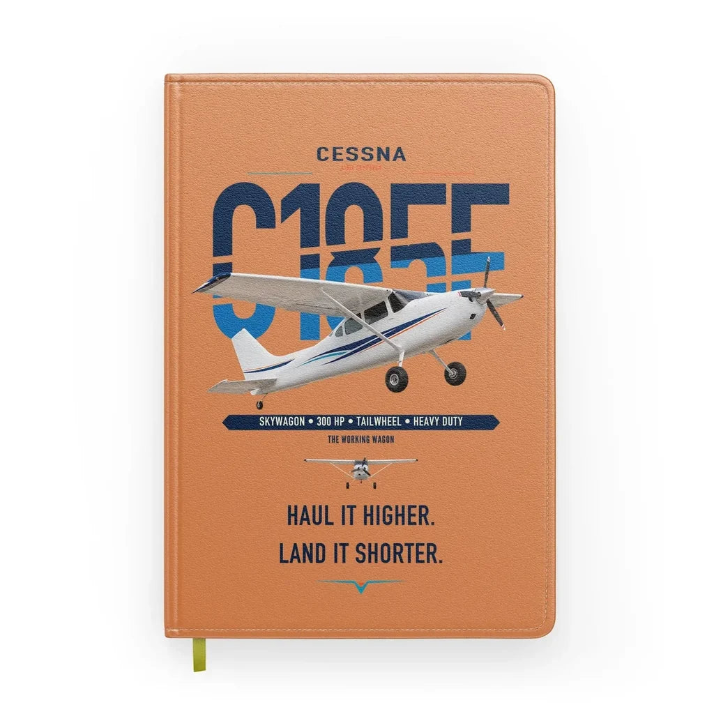 Cessna A185F Skywagon design on orange notebook