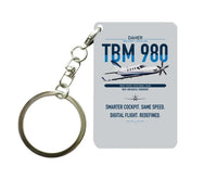 Thumbnail for Daher TBM 980 design on light gray designed key chain, double-side print
