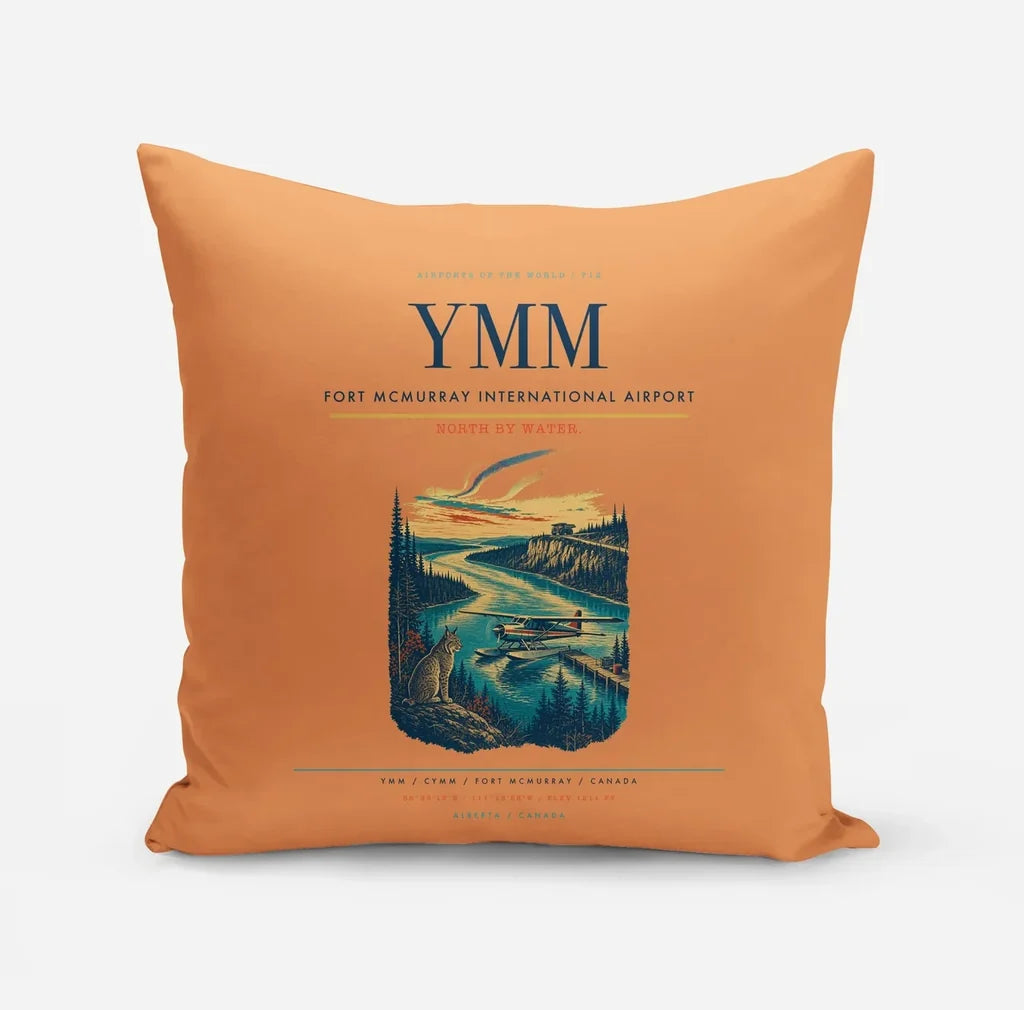 Fort McMurray International Airport (YMM) design on orange pillow