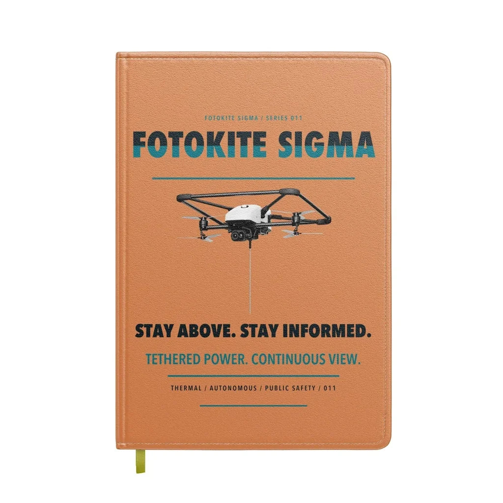 Fotokite Sigma design on orange notebook