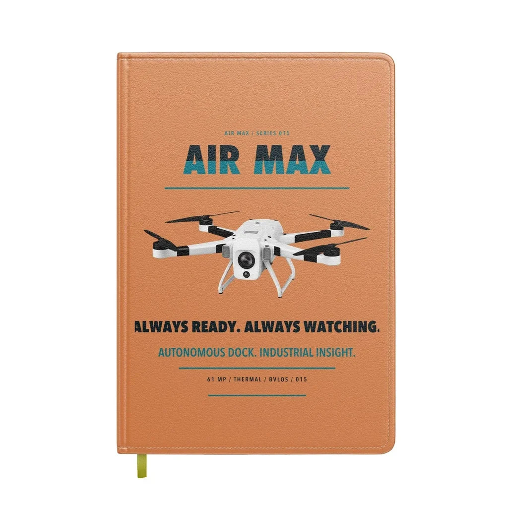 Percepto Air Max design on orange notebook