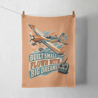 Thumbnail for Built Small Flown With Big Dreams design on orange towel