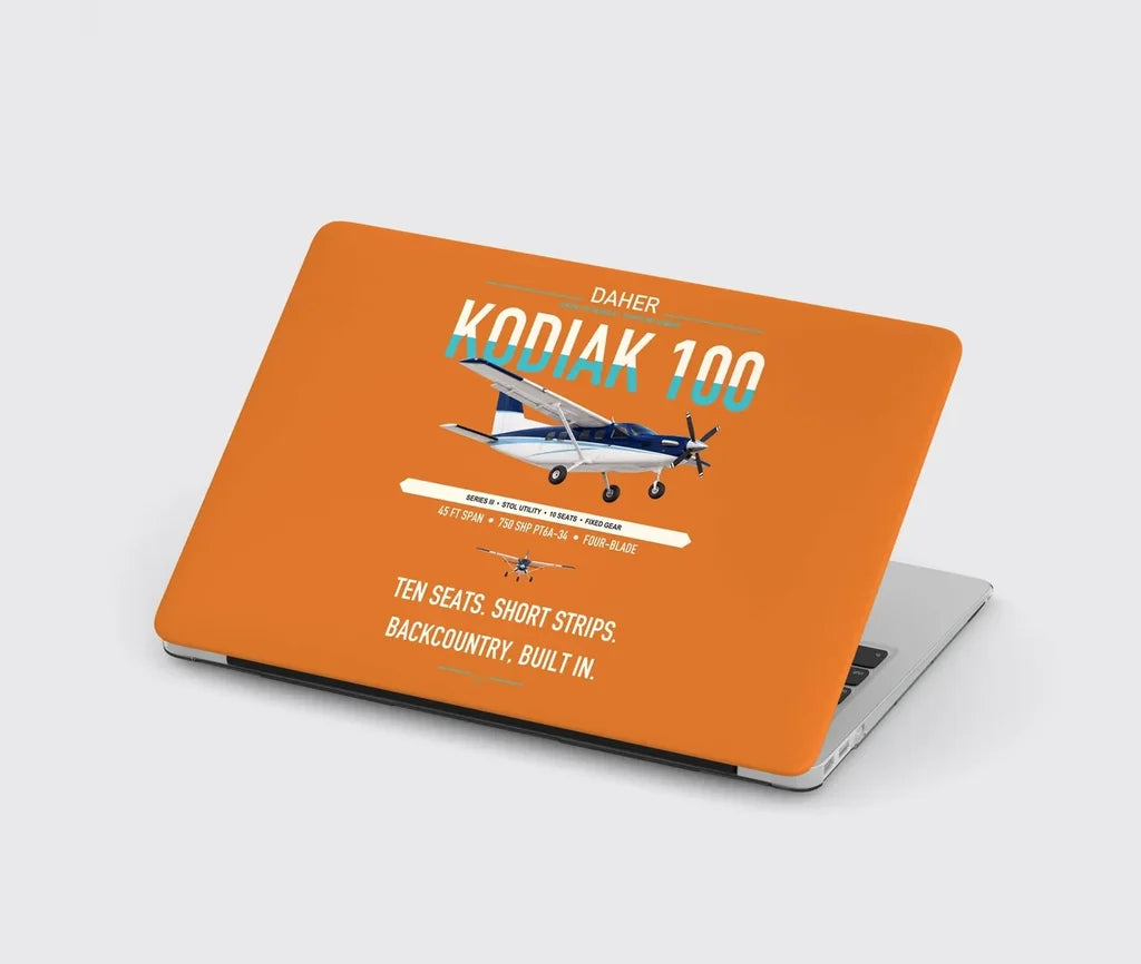 Daher Kodiak 100 Series III design on orange MacBook case