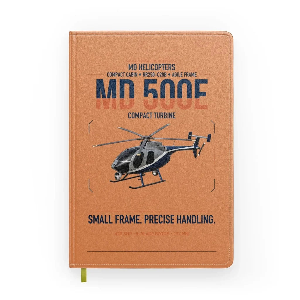 MD Helicopters MD 500E design on orange notebook