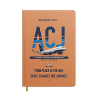 Thumbnail for Airbus ACJ TwoTwenty design on orange notebook