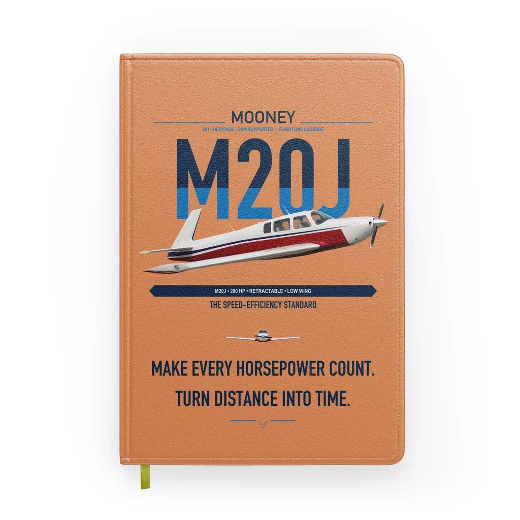 Mooney M20J 201 design on orange notebook