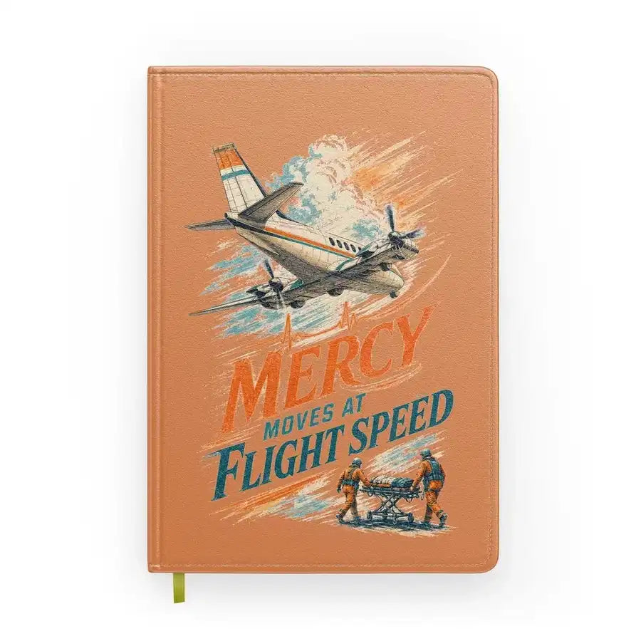 Mercy Moves At Flight Speed design on orange notebook