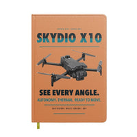 Thumbnail for Skydio X10 design on orange notebook