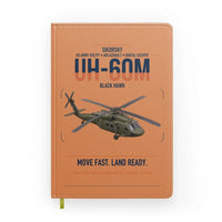 Thumbnail for Sikorsky UH-60M Black Hawk design on orange notebook