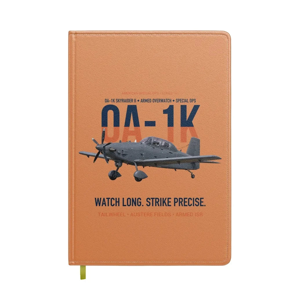 OA-1K Skyraider II Armed Overwatch design on orange notebook