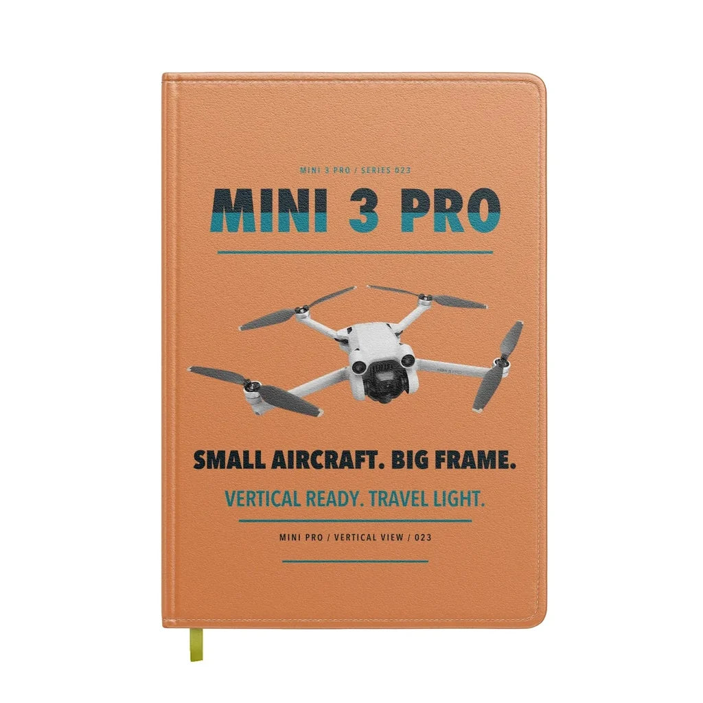 DJI Mini 3 Pro design on orange notebook