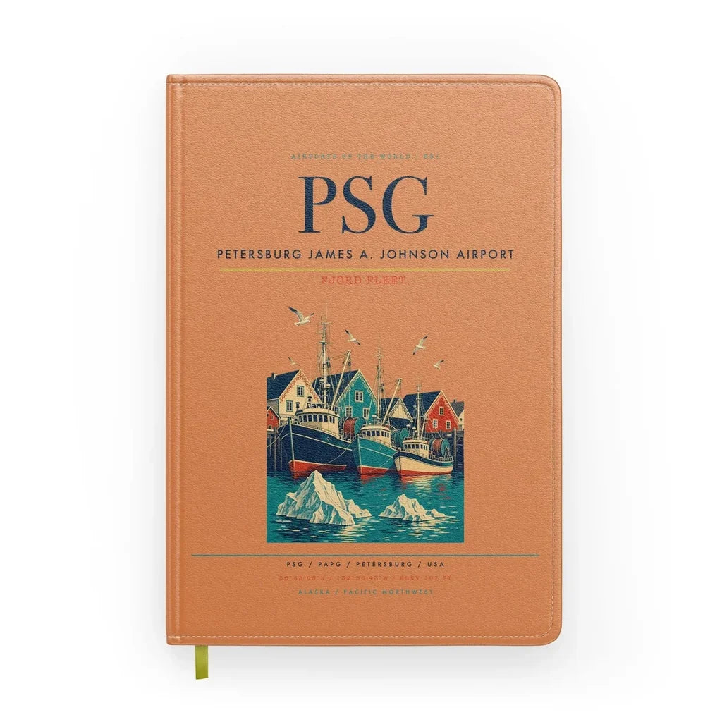 Petersburg James A. Johnson Airport (PSG) design on orange notebook