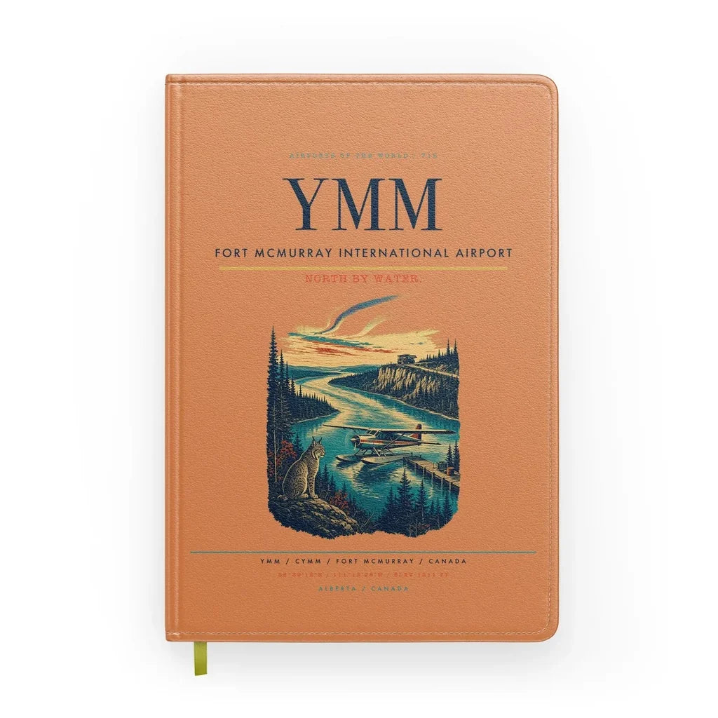 Fort McMurray International Airport (YMM) design on orange notebook