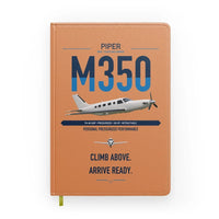 Thumbnail for Piper M350 design on orange notebook