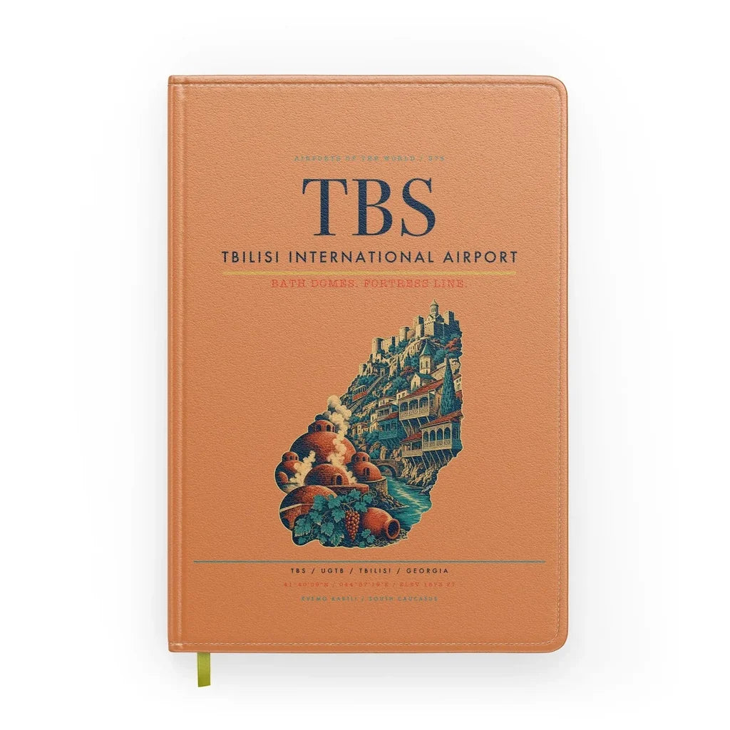 Tbilisi International Airport (TBS) design on orange notebook