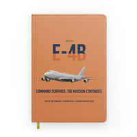 Thumbnail for E-4B Nightwatch design on orange notebook