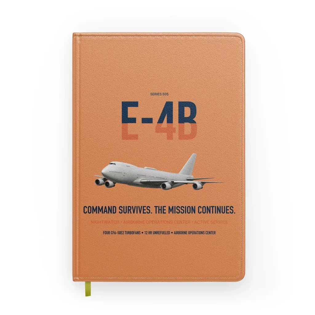 E-4B Nightwatch design on orange notebook