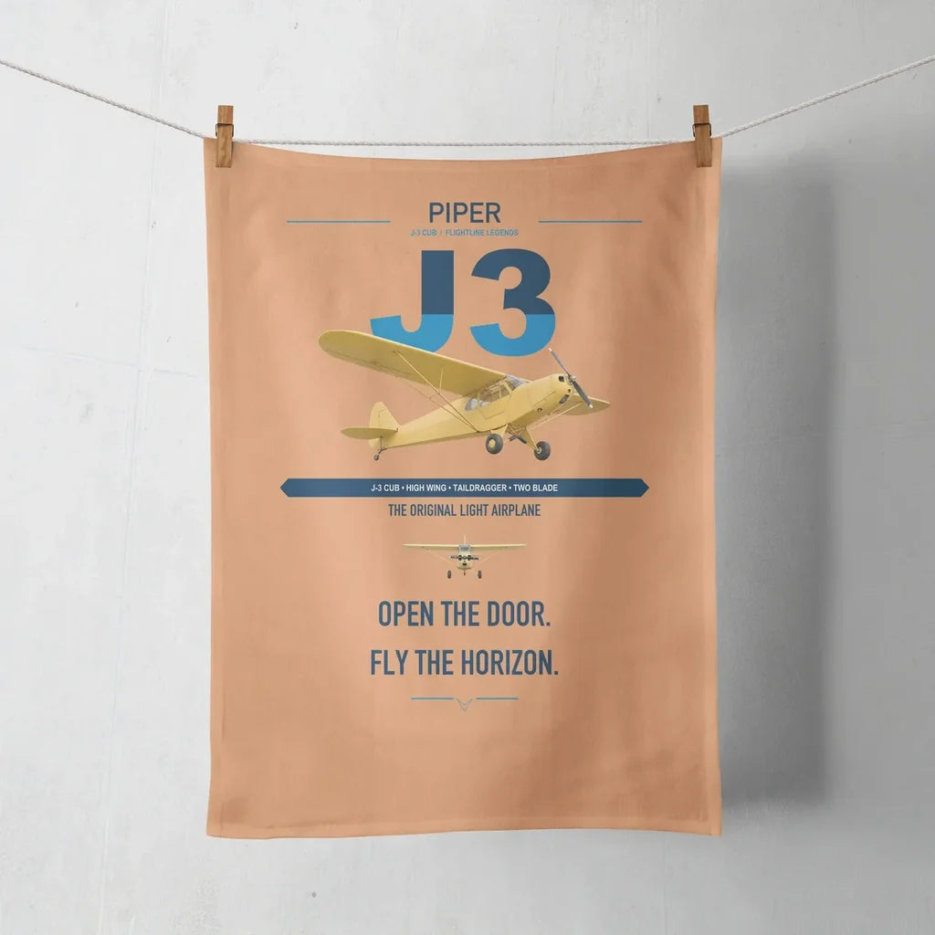 Piper J-3 Cub design on orange towel