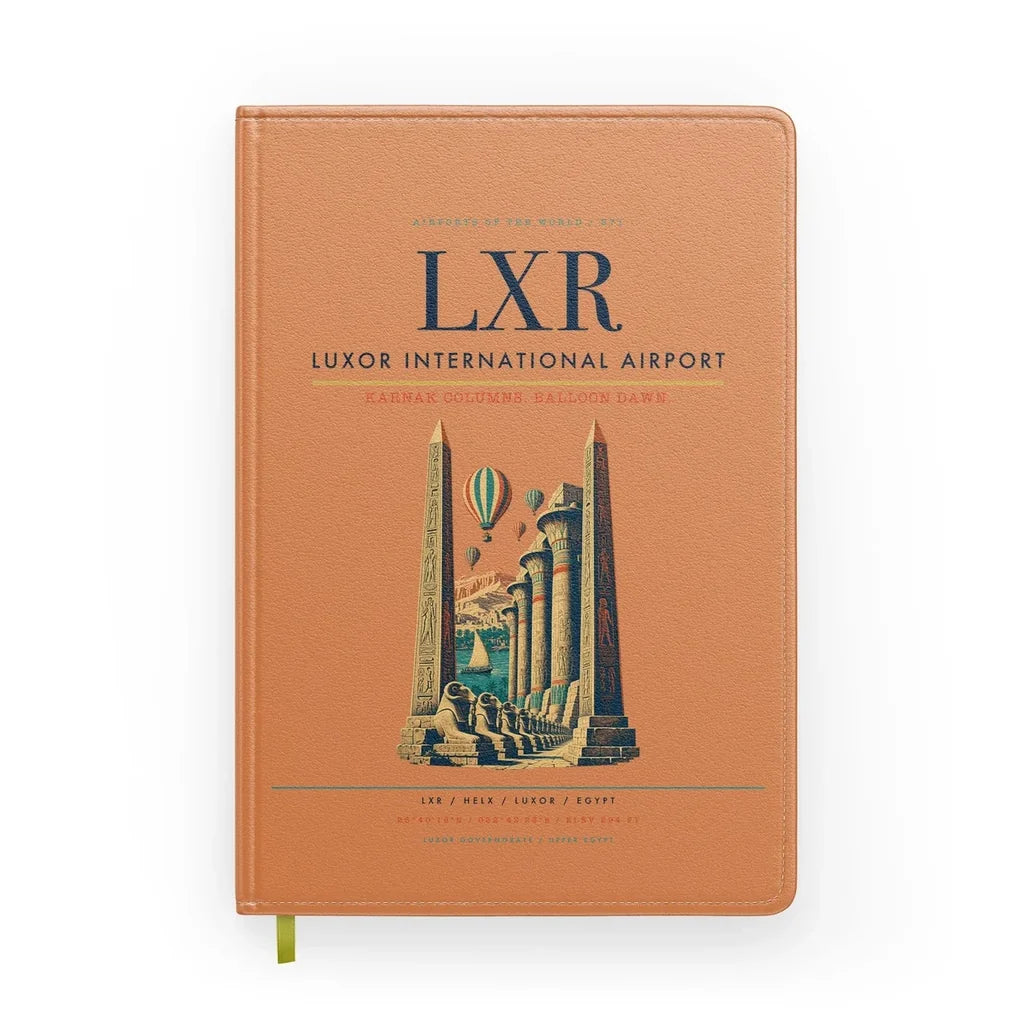 Luxor International Airport (LXR) design on orange notebook