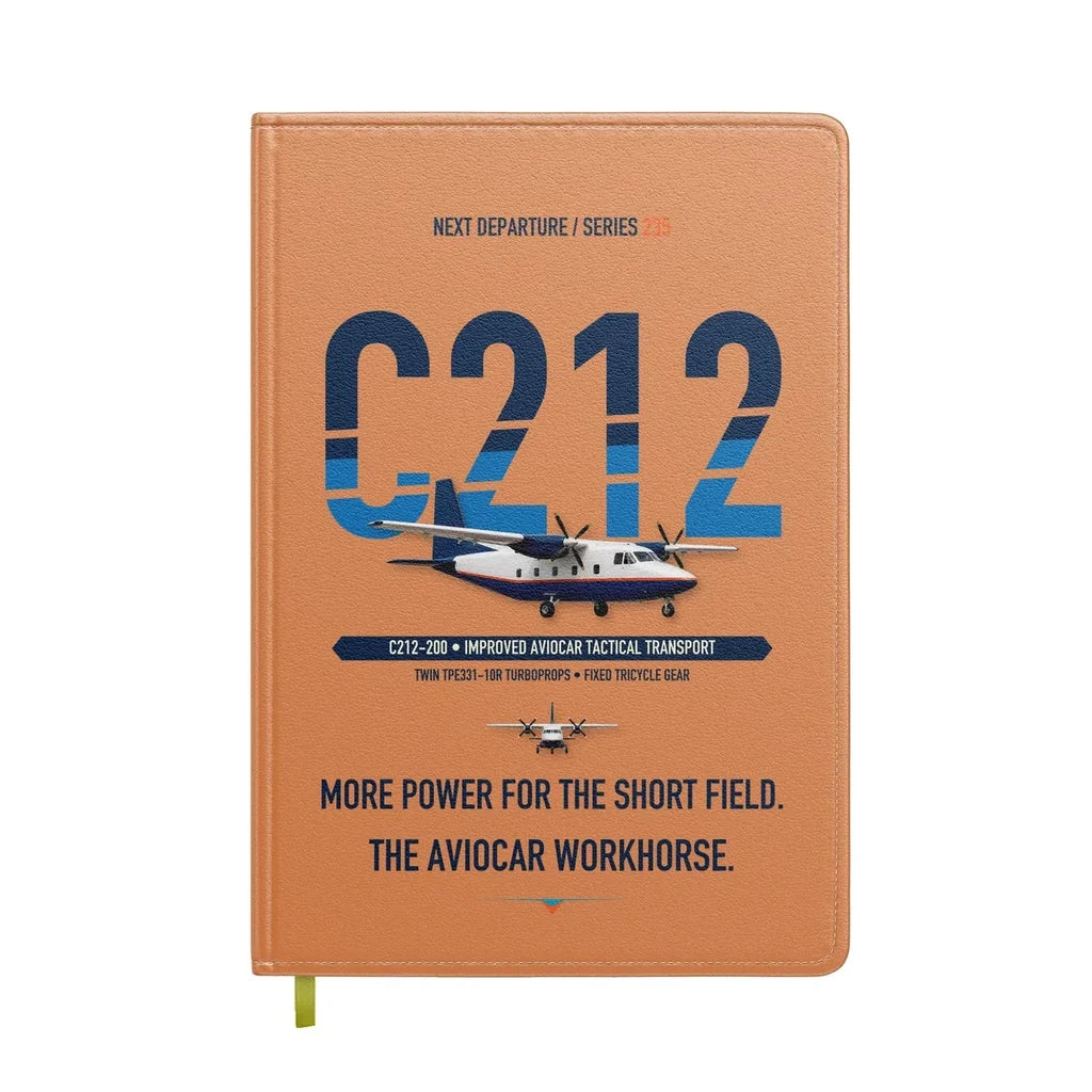 CASA C-212-200 Aviocar design on orange notebook