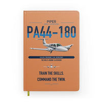 Thumbnail for Piper PA-44-180 Seminole design on orange notebook